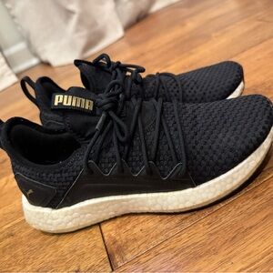 PUMA NRGY Black and Gold Sneakers